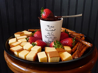 Chocolate Fondue with Strawberries, Pretzels, and Sponge Cake