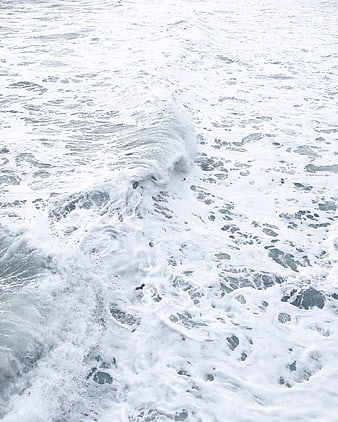 Aerial View of White Sea Foam and Ocean Waves