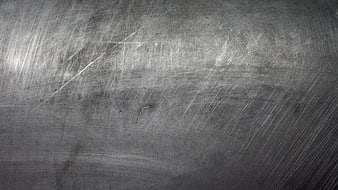 Scratched brushed metal texture background