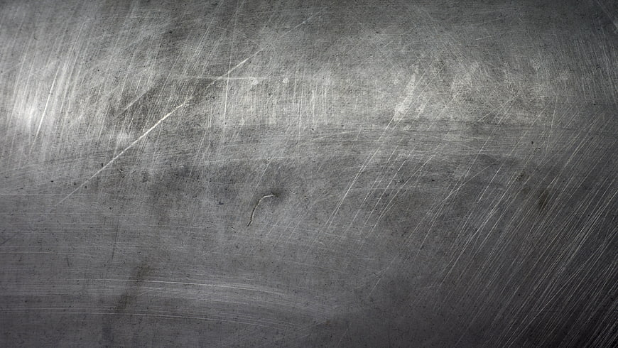 Scratched brushed metal texture background
