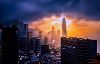 Dramatic Hong Kong Skyline at Sunset with Golden Light