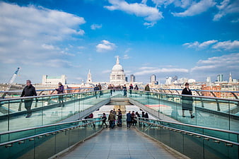People Walking on Millennium Bridge with St Paul's Cathedral