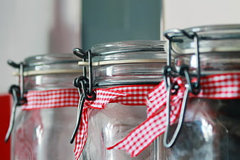 Glass Jars with Red Gingham Ribbons for Kitchen Storage