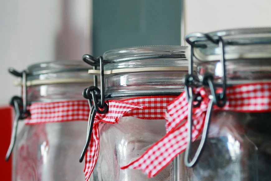Glass Jars with Red Gingham Ribbons for Kitchen Storage