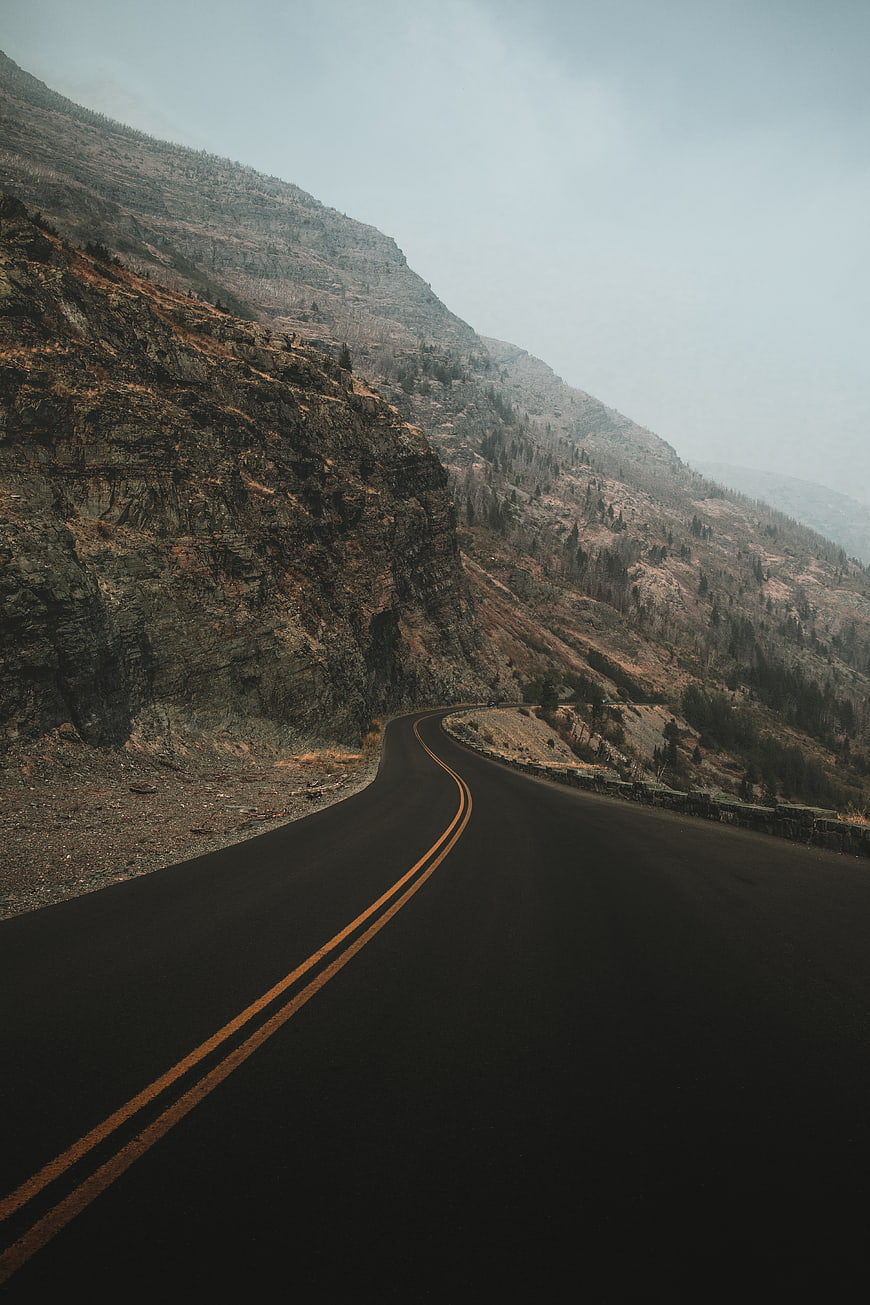 Winding Mountain Road Through Rocky Landscape