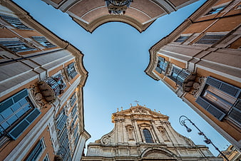 Low angle view of European architecture and church facade