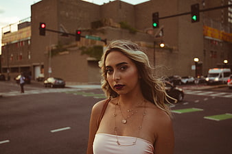 Stylish Blonde Woman Portrait in Urban Street Setting