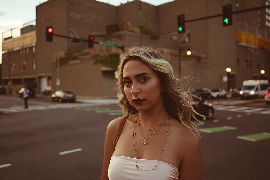 Stylish Blonde Woman Portrait in Urban Street Setting