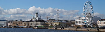 Helsinki Cityscape Panorama With Cathedral And Ferris Wheel