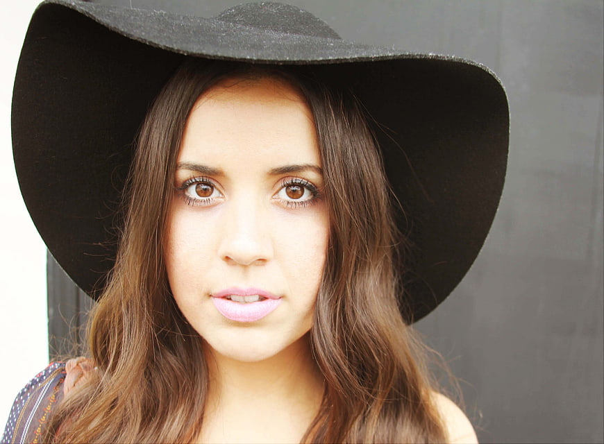 Portrait of Woman in Black Wide Brim Hat