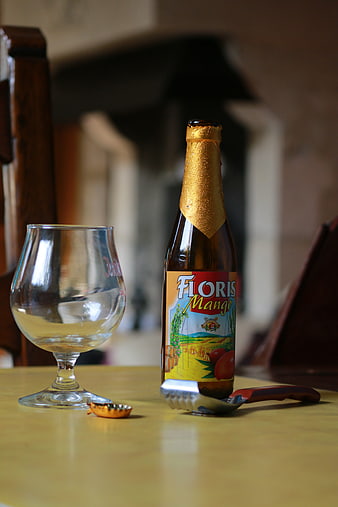 Floris Mango Beer Bottle and Glass on Table