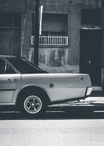 Vintage Classic Car Parked on Urban Street