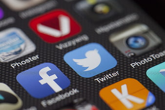 Close-up of Smartphone Screen with Social Media App Icons