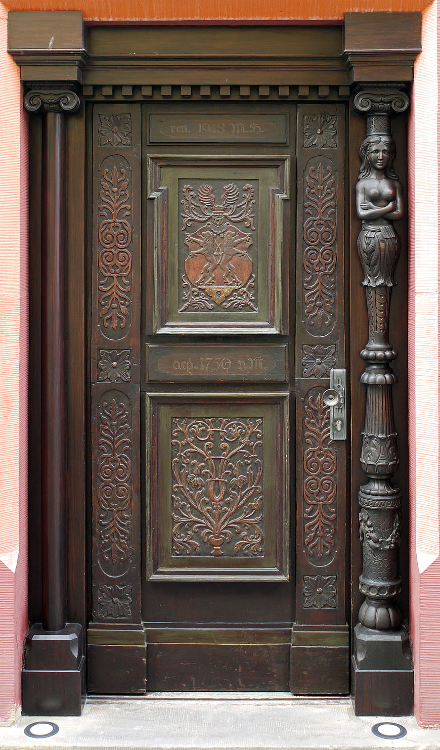 Ornate Historical Wooden Door with Carved Details