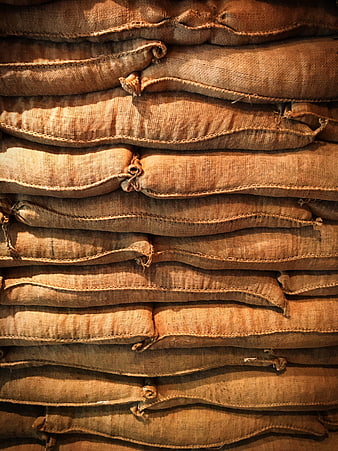 Stacked Burlap Sacks Texture Background