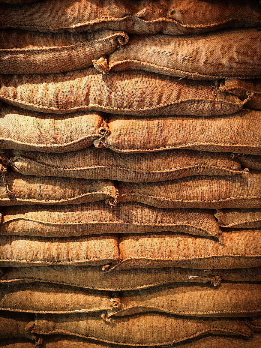 Stacked Burlap Sacks Texture Background