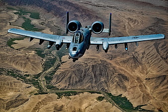A-10 Thunderbolt II Flying Over Desert Canyon
