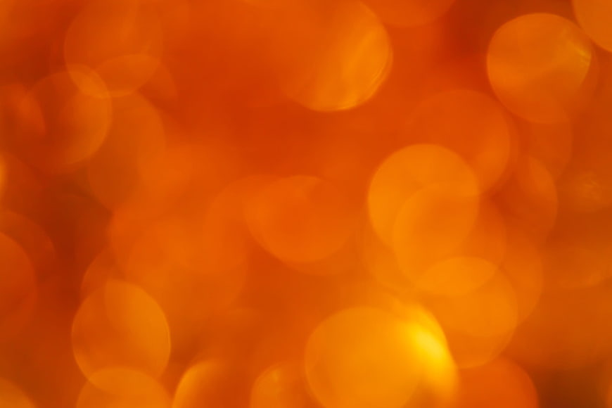 Vibrant Orange Bokeh Abstract Background