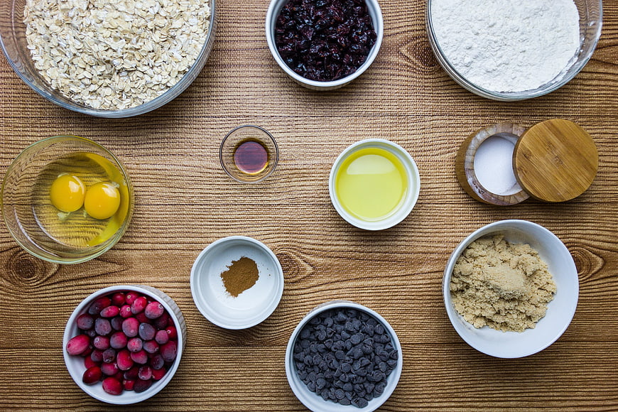 Top view of baking ingredients for cranberry chocolate oat cookies