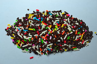 Colorful Chocolate Sprinkles On White Background