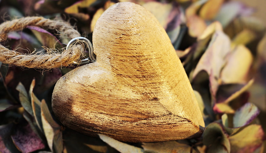 Rustic Wooden Heart Ornament on Dried Hydrangea Leaves