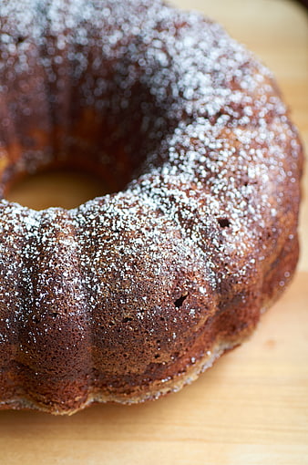 Close-up of chocolate bundt cake with powdered sugar
