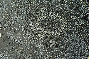 Macro Close-Up of Printed Circuit Board with Electronic Components