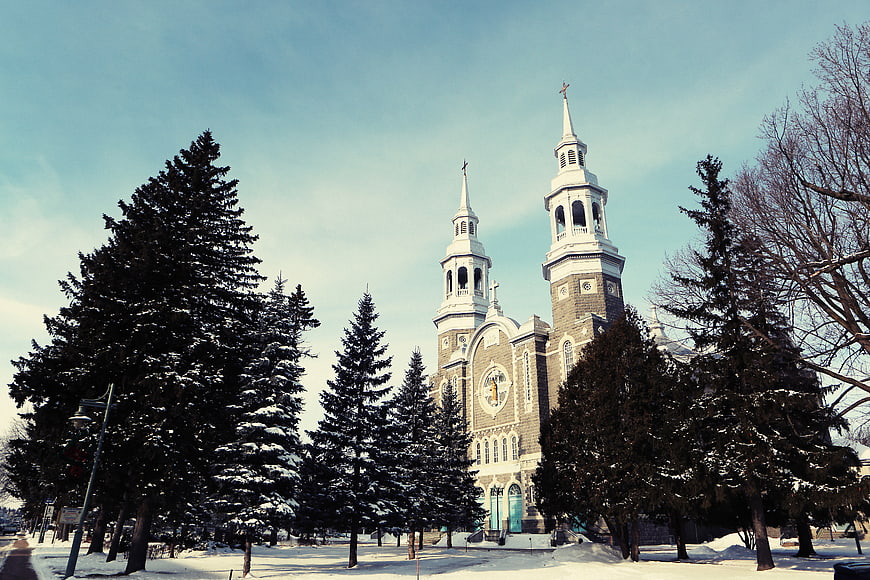 Snowy Catholic Church with Twin Spires in Winter