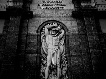 Black and white photo of classical river god statue relief