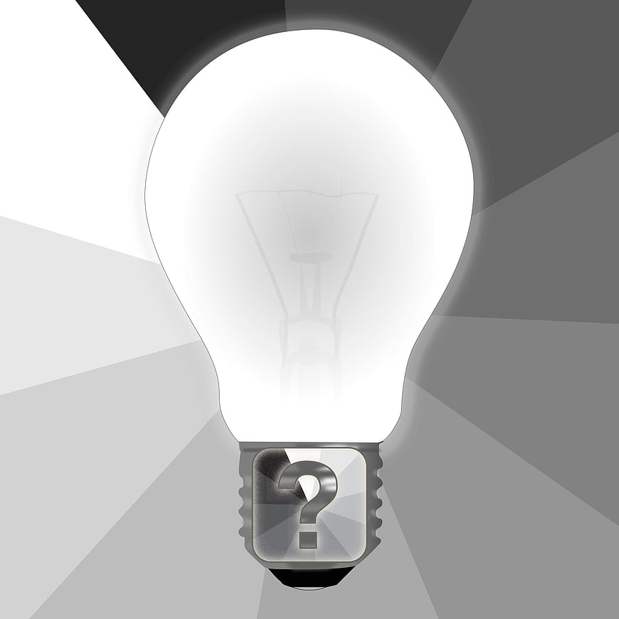 Glowing Light Bulb with Question Mark Symbolizing Ideas