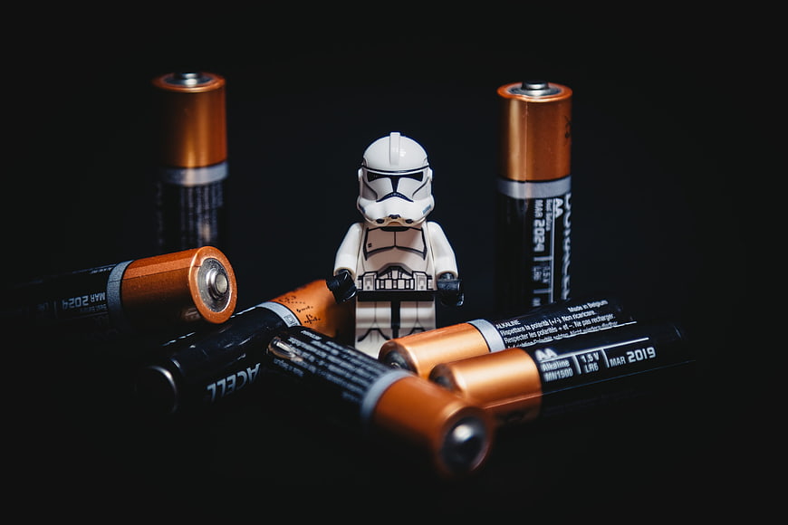 Lego Stormtrooper Minifigure Surrounded By Copper And Black Batteries