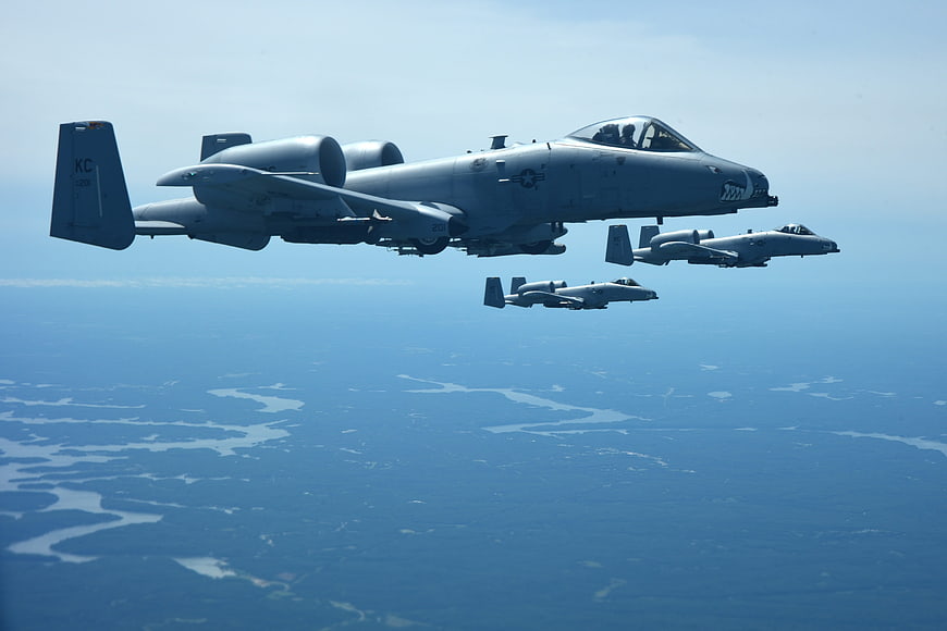 A-10 Thunderbolt II Warthog Formation Flight Over Landscape