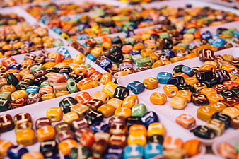 Colorful Alphabet Beads in White Trays for Crafts