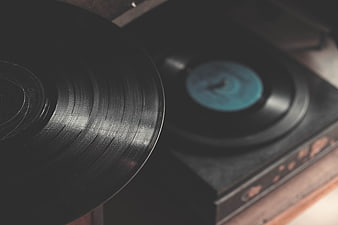 Close-up of vinyl record on vintage turntable