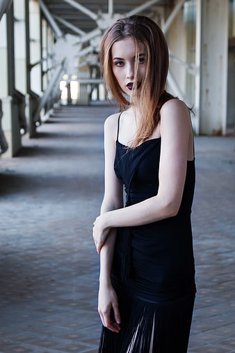 Portrait of Young Woman in Black Dress