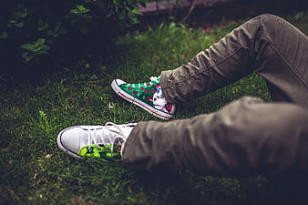 Custom painted sneakers on grass