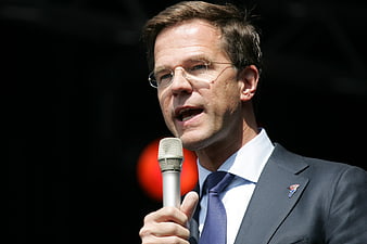Mark Rutte Speaking Into Microphone During Political Event