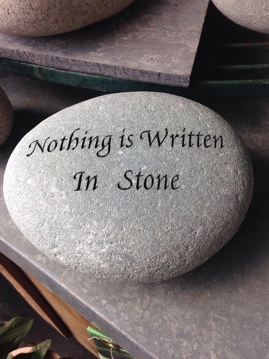 Inspirational Stone with Quote Nothing is Written in Stone