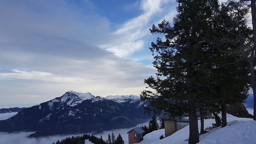 Snowy Mountain Cabin with Sea of Clouds