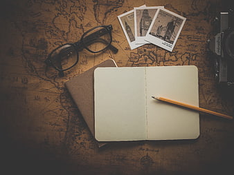 Vintage Travel Journal Flat Lay with Map, Camera, and Postcards
