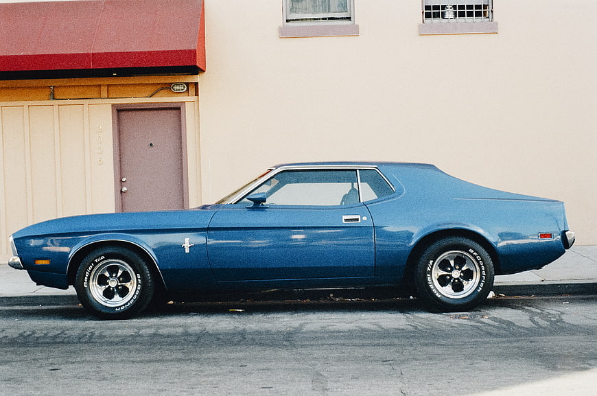 Side Profile of Blue Classic Ford Mustang Mach 1
