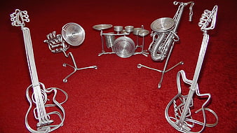 Handcrafted Wire Musical Instruments on Red Carpet
