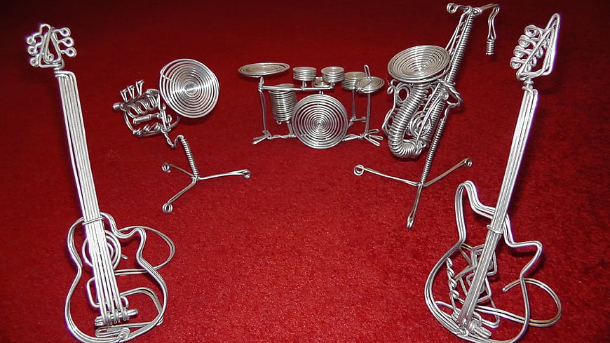 Handcrafted Wire Musical Instruments on Red Carpet
