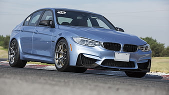 Blue BMW M3 on Race Track