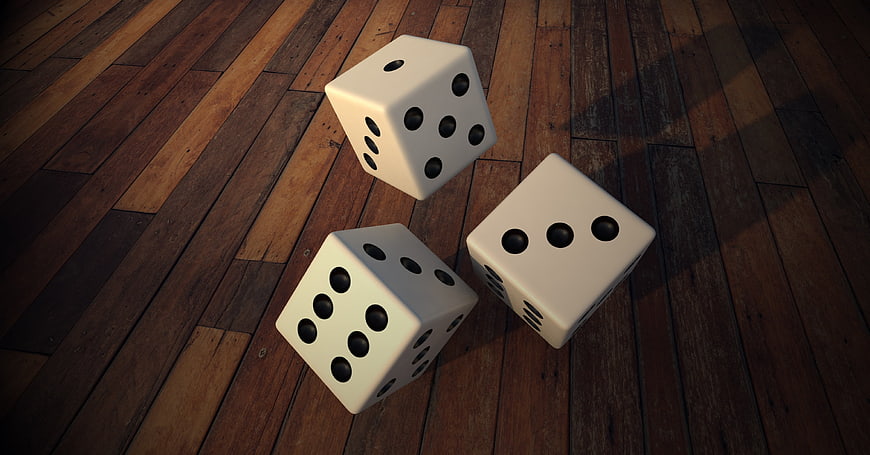 Three white dice on a dark wooden floor 3D render