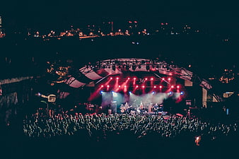 Live Band Concert at Night with Crowd and Stage Lights