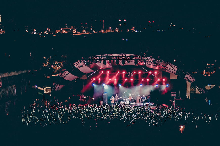 Live Band Concert at Night with Crowd and Stage Lights