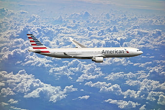 American Airlines Jet Flying Above Clouds