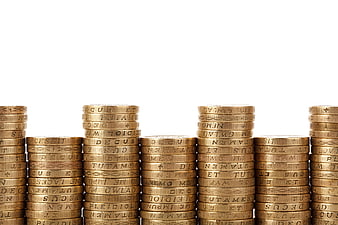 Stacks of gold coins on white background
