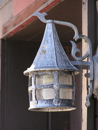 Vintage Weathered Outdoor Lantern on Wooden Wall